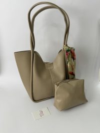 Elegant beige women's bucket bag with floral scarf and pouch.