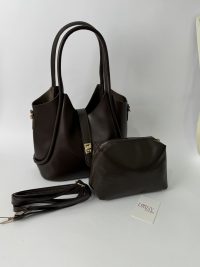 Elegant brown women's bucket bag with detachable strap and pouch.