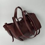 Masa mini bordo handbag from Daisy Store with straps.
