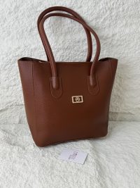 Brown leather university bag with handles, Daisy Store tag.