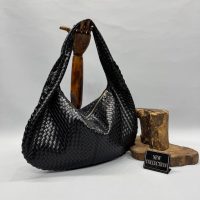 Elegant woven handbag, black, ideal choice, new collection display.
