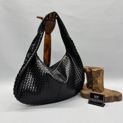 Elegant woven handbag, black, ideal choice, new collection display.
