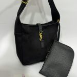 Black YSL style university bag with pouch and gold accents.