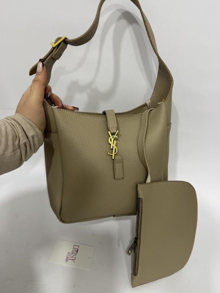 Beige woven hobo bag with gold accents and detachable pouch.