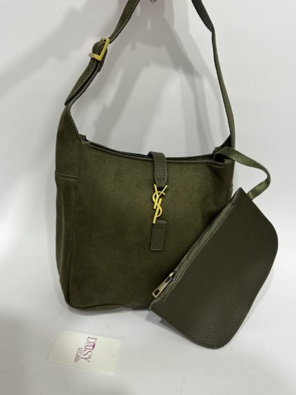 Structured green bag with scarf, elegant accessory for any occasion.