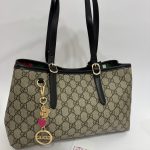 Elegant Çanta bucket bag with black handles, Daisy Store.