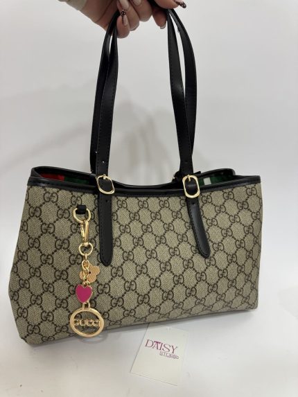 Elegant Çanta bucket bag with black handles, Daisy Store.