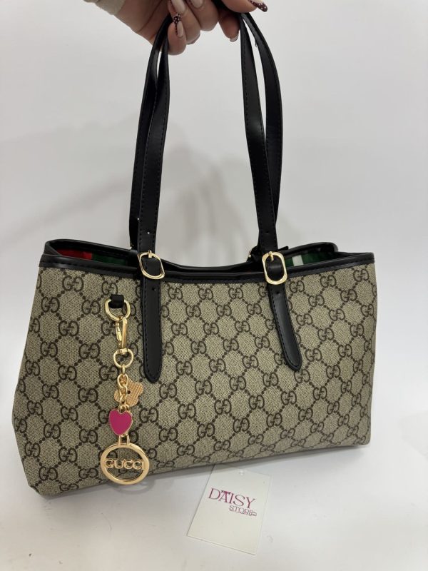 Elegant Çanta bucket bag with black handles, Daisy Store.