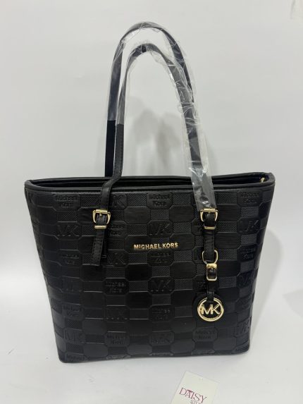Black Michael Kors tote bag with embossed logo design.