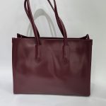 Bordo university bag with elegant design and sturdy handles.