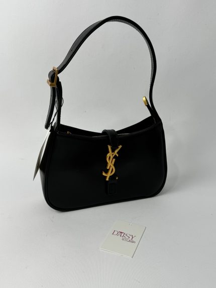 Elegant black YSL Hobo bag with gold logo and strap.