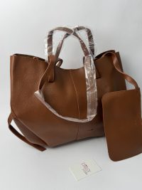 Polene brown tote bag with small pouch on white background.