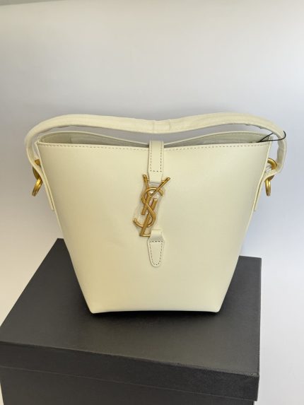 Elegant YSL bucket bag with gold accents for women.
