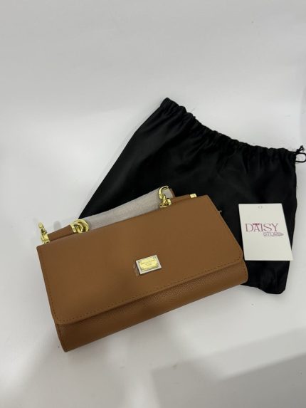Dolce Gabbana brown handbag with strap, elegance and style.