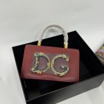 Dolce Gabbana Devotion bag with gold DG logo in box.