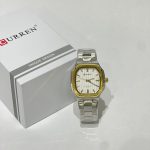 Ora Katrore Dial e Bardhë watch with silver band and box.