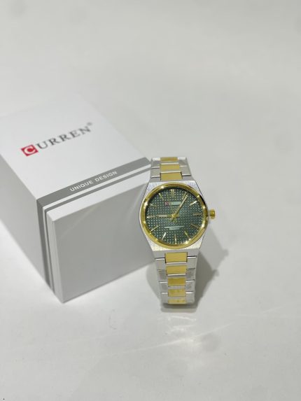 Curren Ora Rrumbullake Dial Jeshile watch with green dial and gold accents.