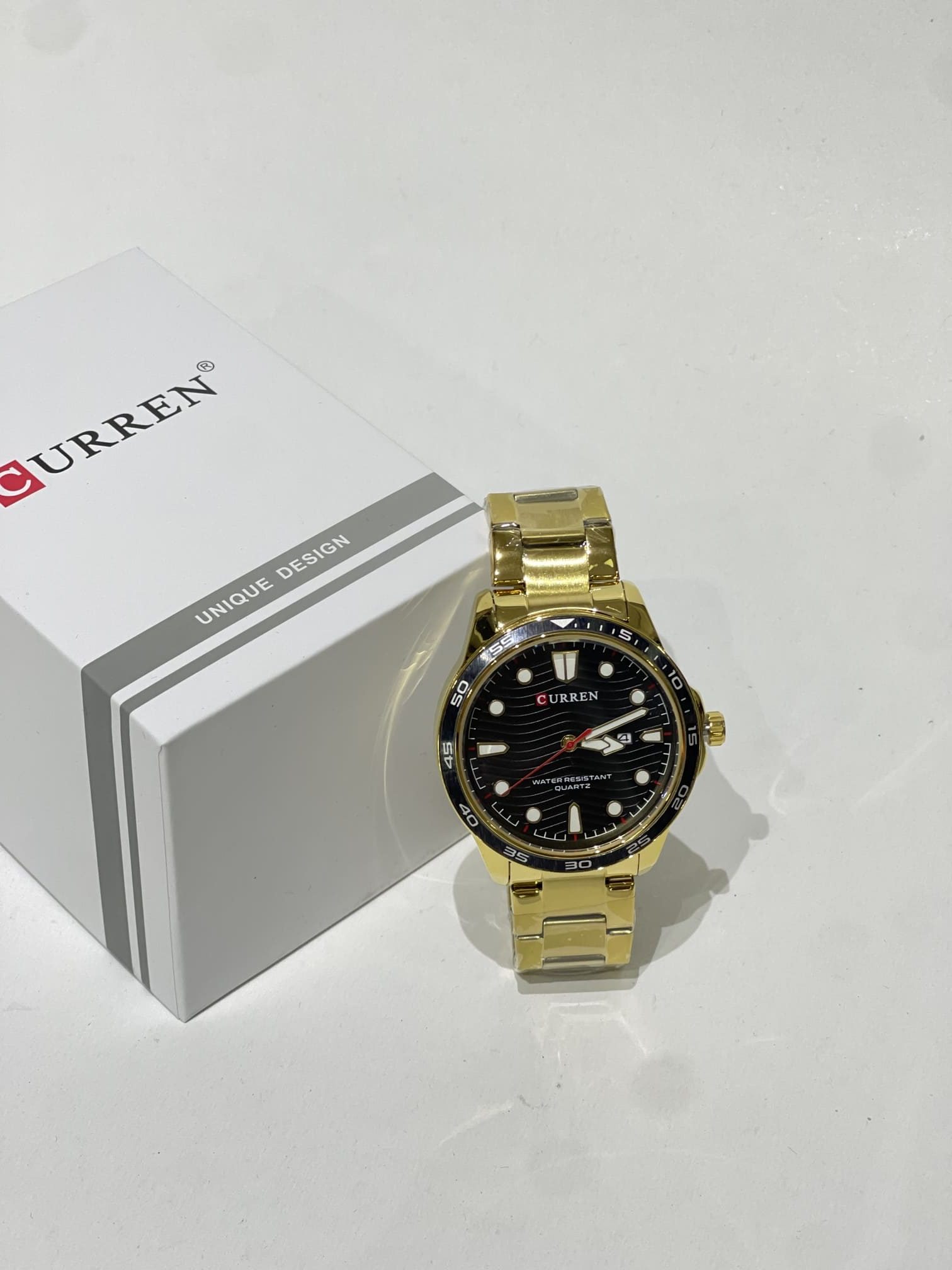ds-ora-008-kryesore Curren Ora Diver Dial Men's Watch, gold bracelet, black face.