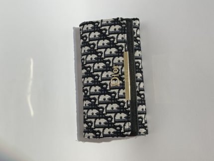 Elegant Dior women's wallet with monogram pattern.