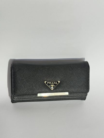 Elegant black women's wallet with logo detail.
