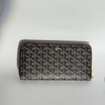 Elegant Goyard women's wallet with signature pattern design.