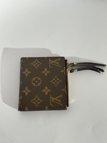Elegant Louis Vuitton women's wallet with iconic monogram design.