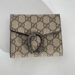 Elegant Goyard women's wallet with stylish pattern and buckle.