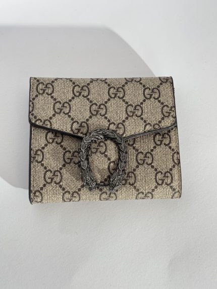 Elegant Goyard women's wallet with stylish pattern and buckle.