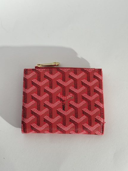 Red Goyard women's wallet with elegant pattern design.