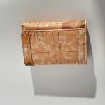 Elegant women's wallet with vintage map design.