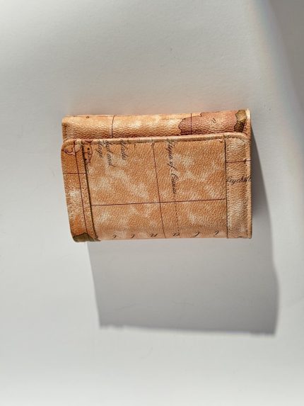 Elegant women's wallet with vintage map design.