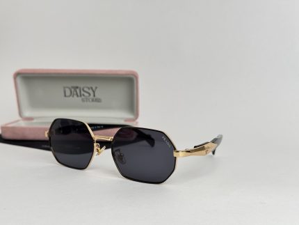 Prada women's sunglasses with gold frame and black lenses.