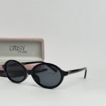 Black YSL women's sunglasses with case, stylish and elegant design.