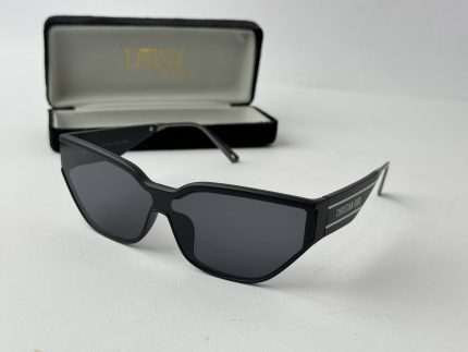 Tom Ford women's sunglasses with black frame and case.