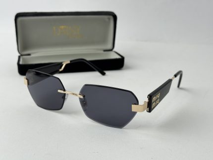 Elegant YSL women's sunglasses with black lenses and gold accents.