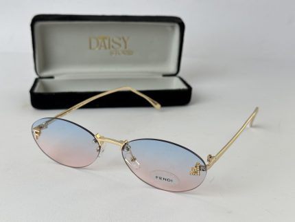 Elegant Saint Laurent women's sunglasses with gradient lenses and gold frame.