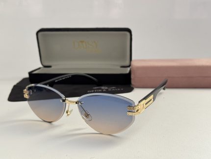 Gucci women's sunglasses with gradient lenses and gold accents.