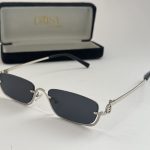 Syze Dielli Celine për Femra sunglasses with sleek black lenses and case.