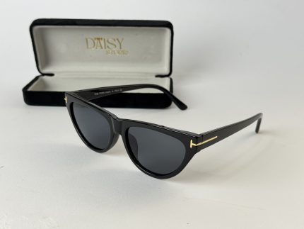 Prada women's sunglasses with black frame and case.