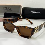 Christian Dior women's tortoiseshell sunglasses with polarized lens.