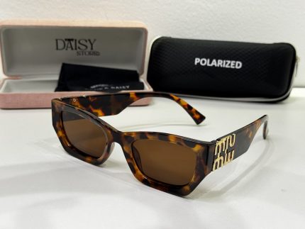 Christian Dior women's tortoiseshell sunglasses with polarized lens.