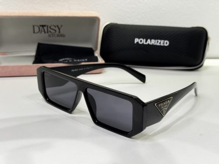 Black rectangular sunglasses with case, labeled Prada and polarized.