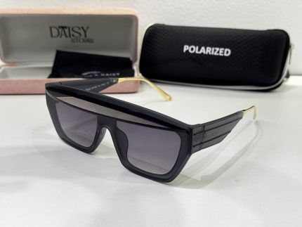 Prada women's sunglasses with black frame and polarized lenses.