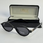 Miu Miu women's sunglasses with case, stylish black design.