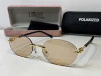 Tiffany & Co. sunglasses with gold accents and polarized lenses.