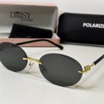 Tiffany & Co. sunglasses with gold accents and polarized lenses.