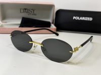 Tiffany & Co. sunglasses with gold accents and polarized lenses.