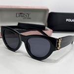 Saint Laurent women's sunglasses with case, elegant black design.