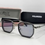 Elegant Cartier women's sunglasses with polarized lenses and case.