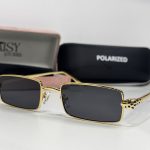 Elegant Cartier women's sunglasses with gold frames and polarized lenses.